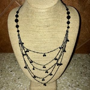 Pretty, black necklace.